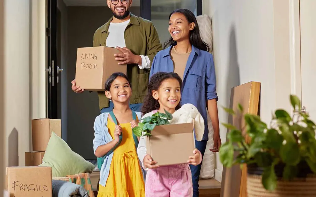 A happy family relocating internationally to a new country by following the 7 step guide